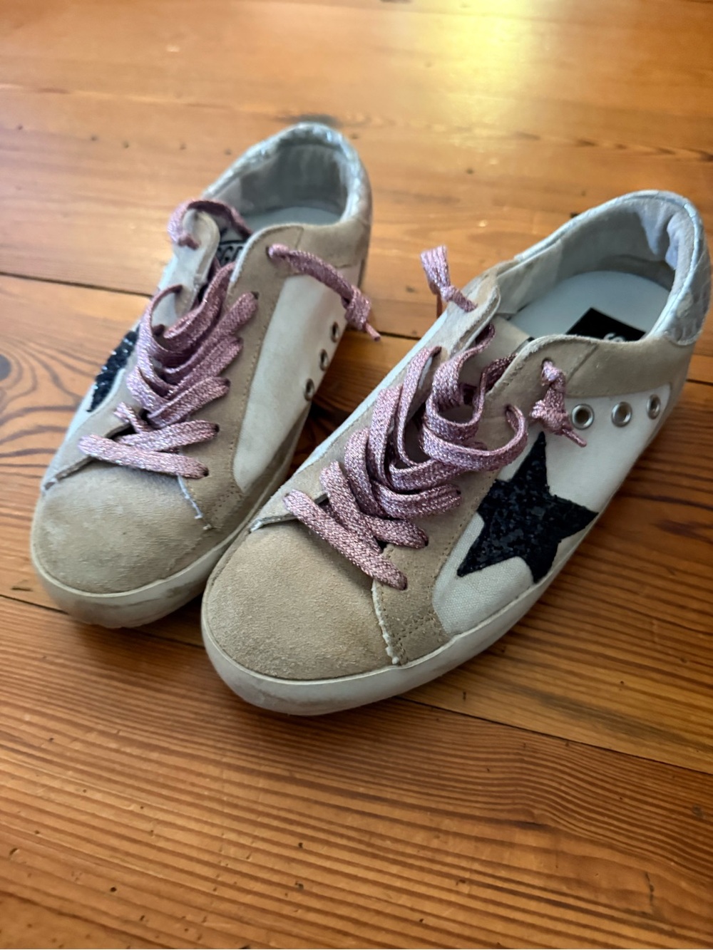 Golden Goose Beige and Black Star Sneakers with Pink Sparkle Laces